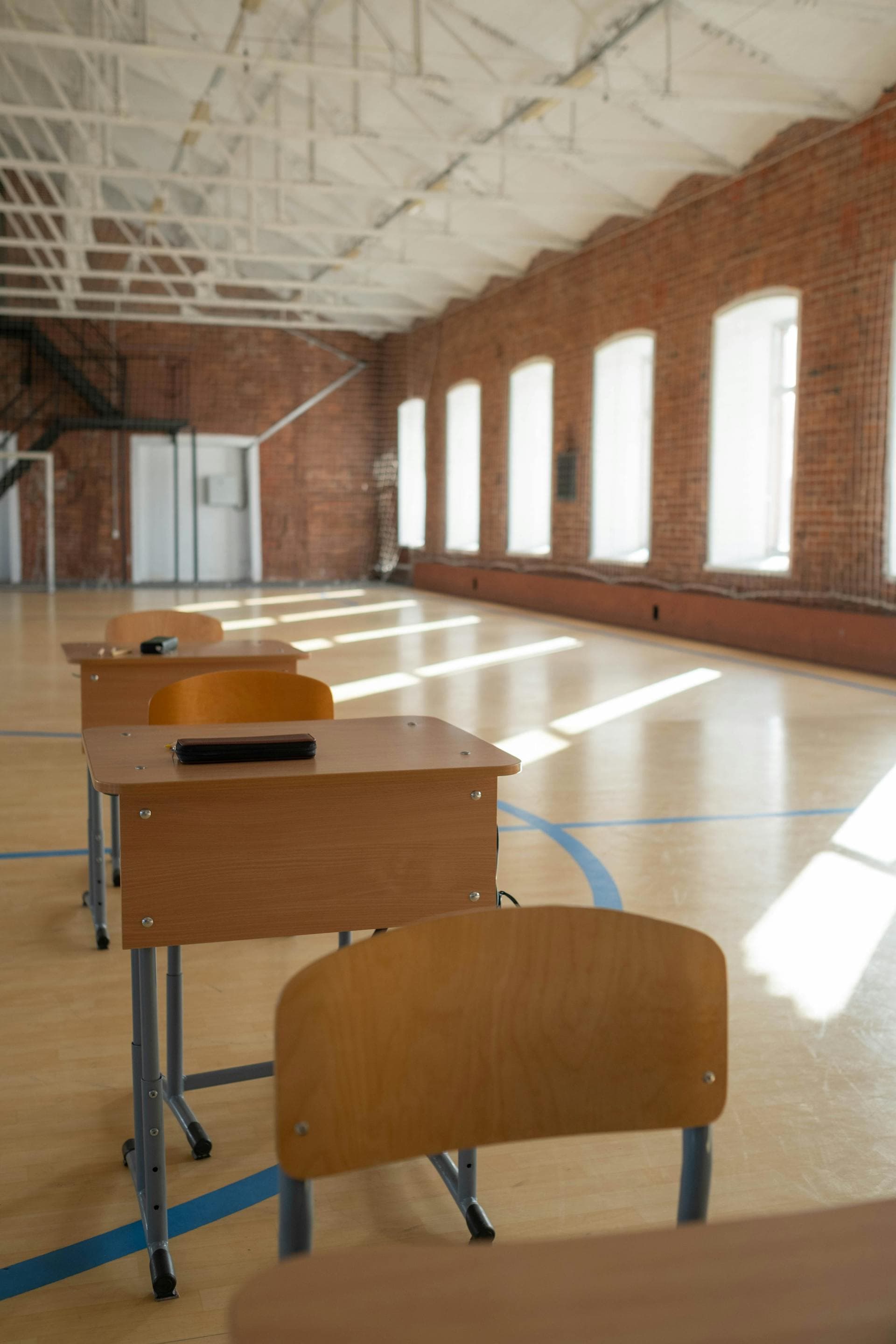Classroom with wooden desks built for volume daily use